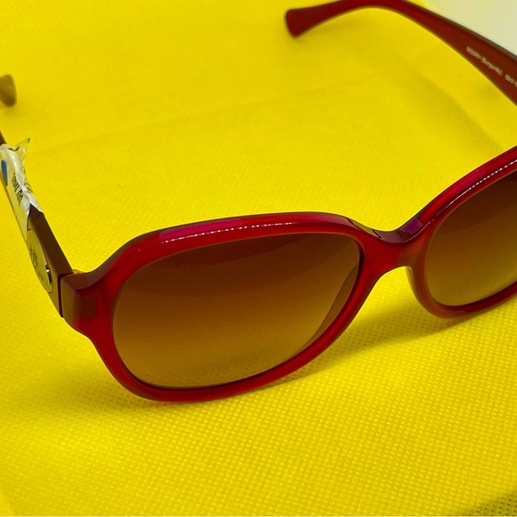 Used Coach burgundy color sunglasses in good condition. - Picture 2 of 6